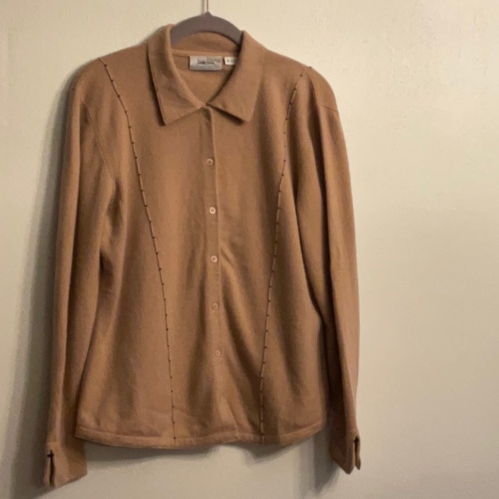 100% cashmere cardigan. Believe it is a size large. Split cuff.